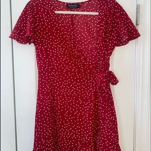 Red and white polka dot wrap dress.